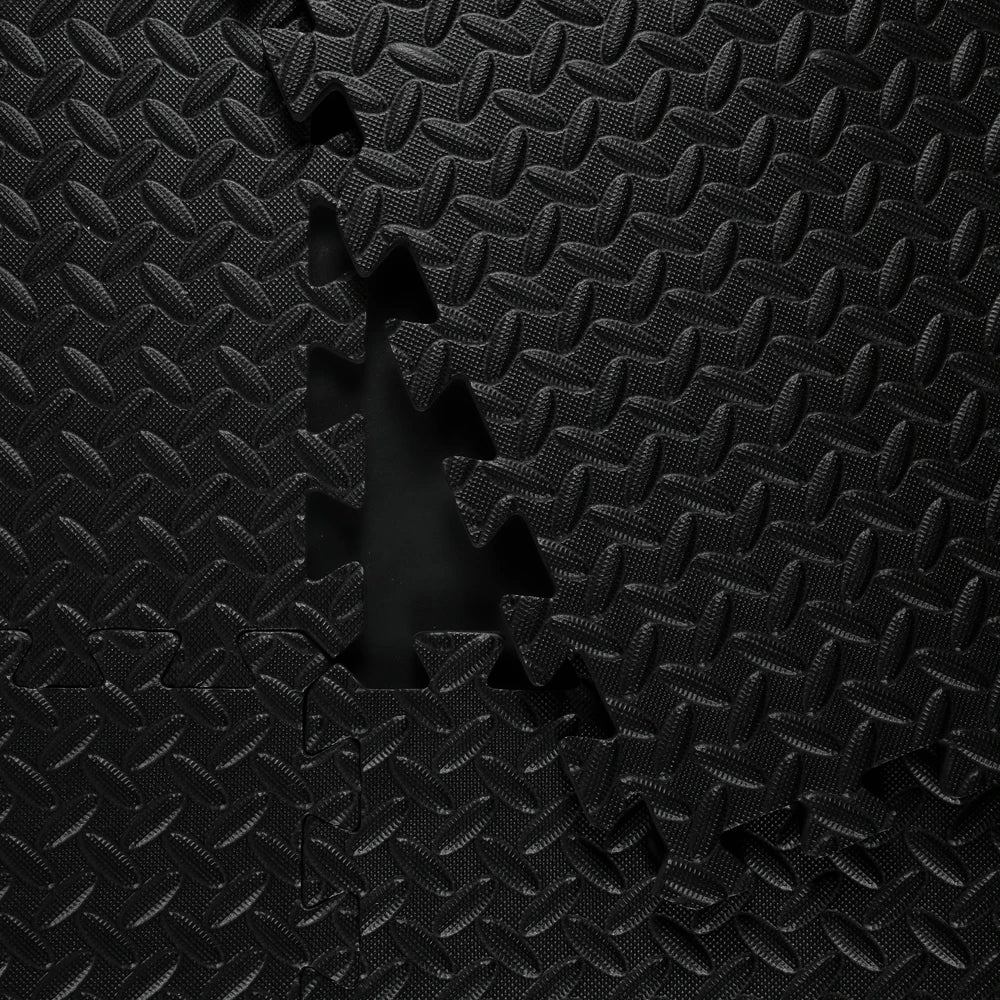 Black interlocking foam mat with textured surface