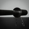 Barbell with weight grips on a gray background