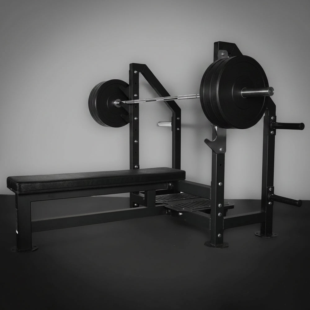 Weight bench with barbell loaded with weights in a gym setting