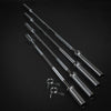 Set of metal barbells on a black background