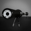 Barbell with weight plates on a dark background