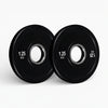 Two black weight plates on a white background