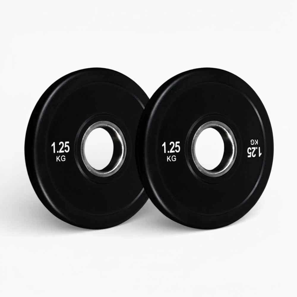 Two black weight plates on a white background