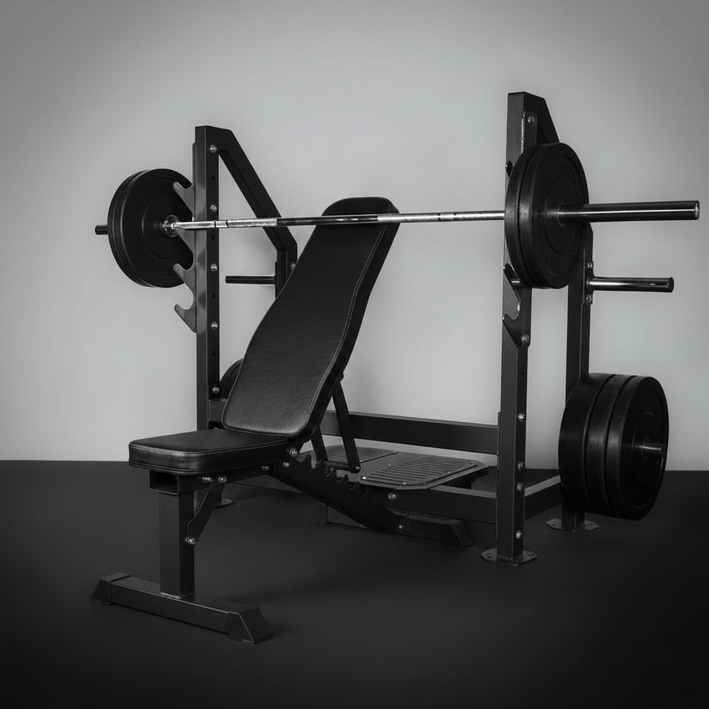 Weight bench with barbell and weights on a gray background