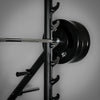 Barbell with weight plates on a gray background