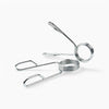 Metallic barbell weight clips on a white background