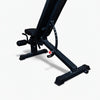 Black adjustable gym bench on a white background