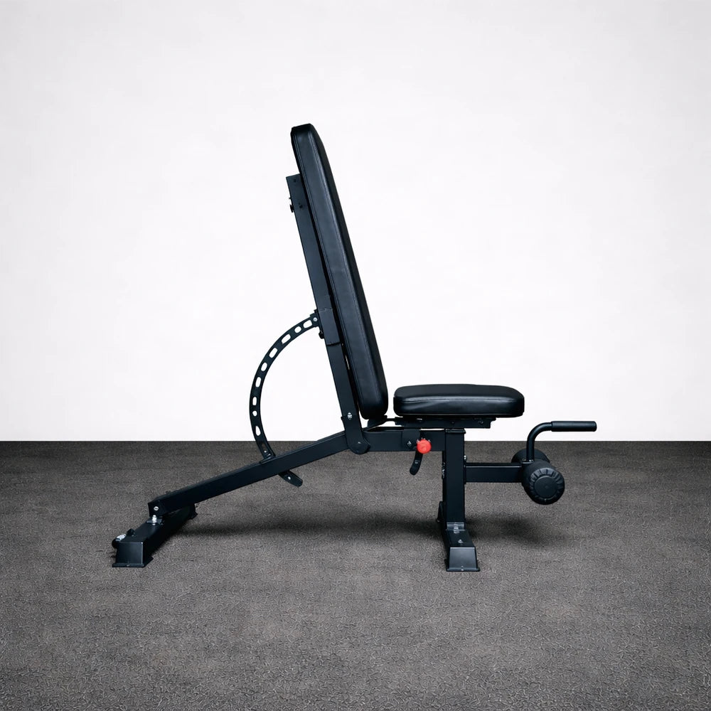 Black weight bench on a gray floor with a white background