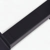 Black barbell plate on a white background