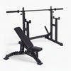 Black weight bench with barbell on a white background