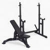 Black weight bench with weight rack on a white background