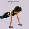 Woman exercising with purple dumbbells on a light purple background, promoting safety with hexagonal shape feature.