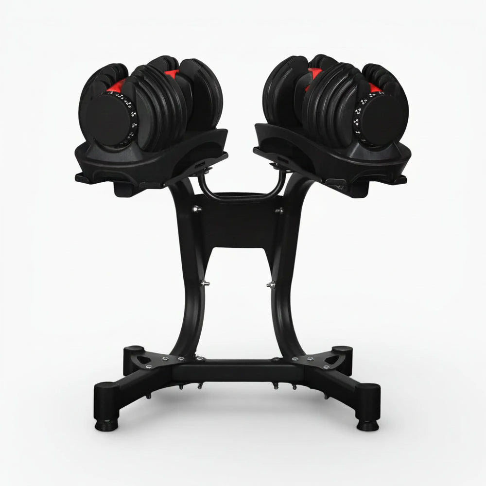 Pair of adjustable dumbbells on a black stand against a white background
