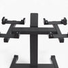 Black metal stand with multiple arm attachments on a white background