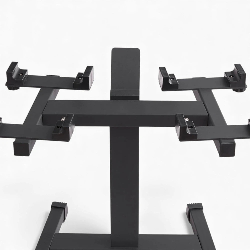 Black metal stand with multiple arm attachments on a white background