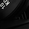 Close-up of a gym weight plate.