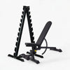 Black weight bench and weight rack on a white background