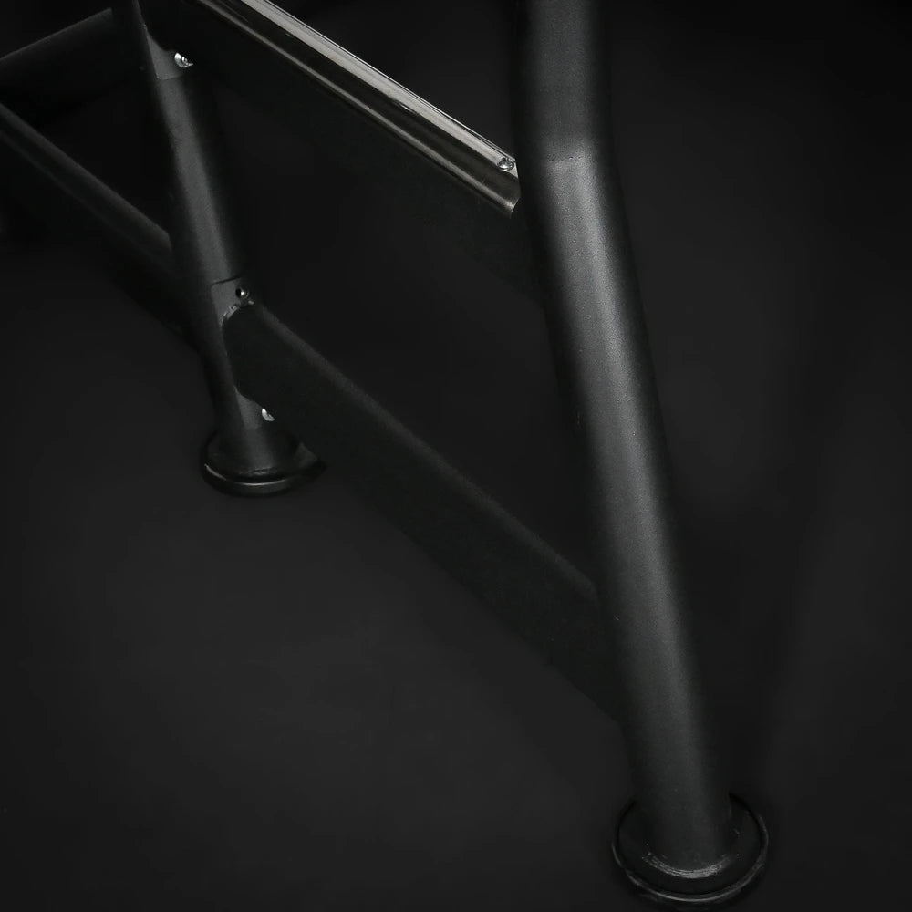 Black metal ladder on a black background