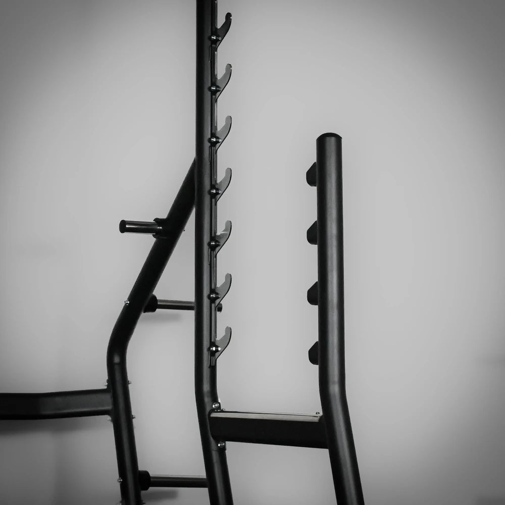 Black metal weight rack against a gray background