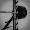 Barbell with weight plates on a gray background
