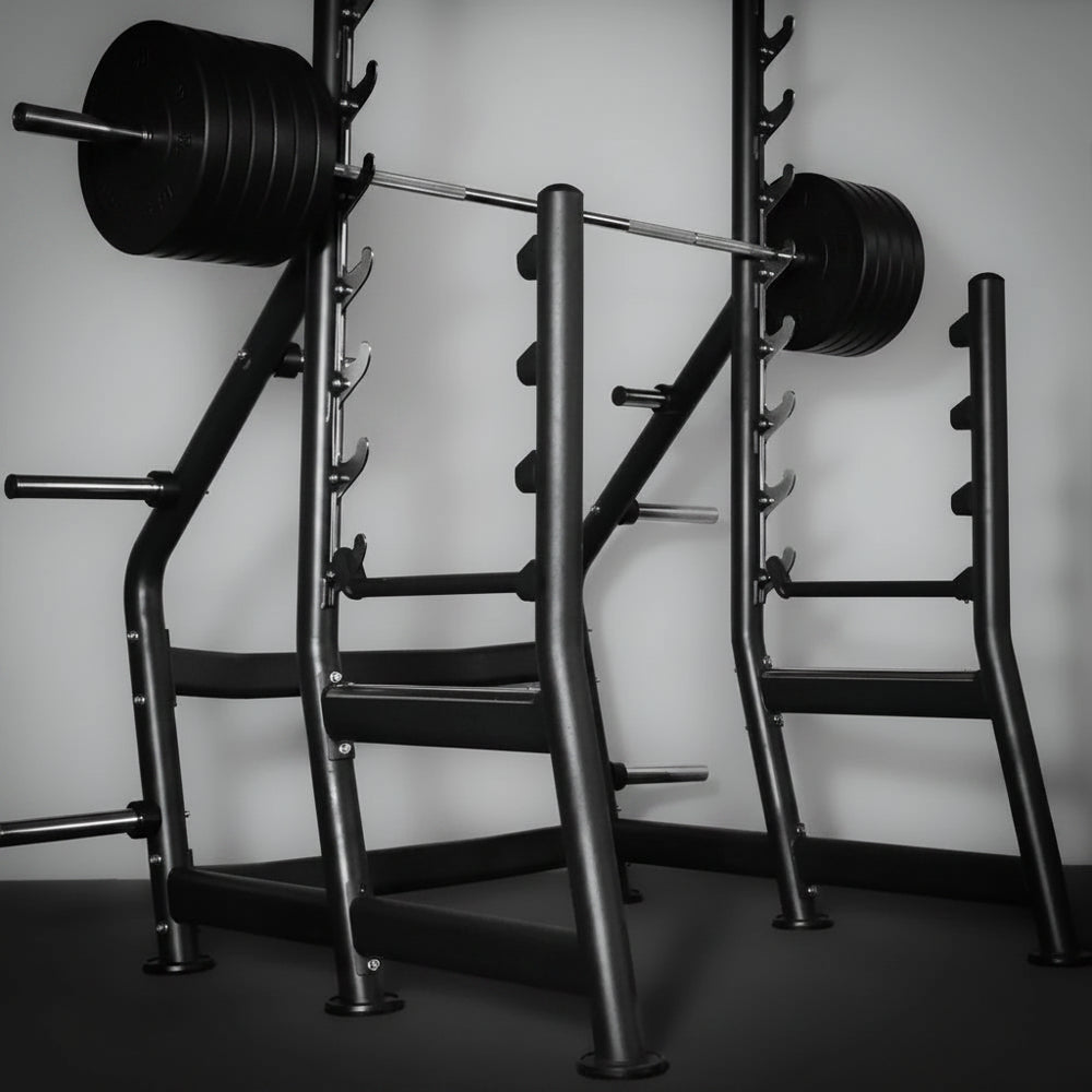 Weightlifting rack with barbell on a plain background