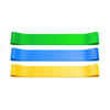 Three resistance bands in green, blue, and yellow on a white background