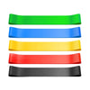 Set of colorful resistance bands on a white background