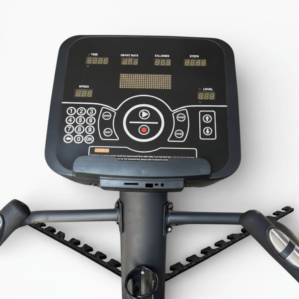 Control panel of a stationary bike with digital display on a white background