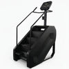 Black step machine with digital display on a white background