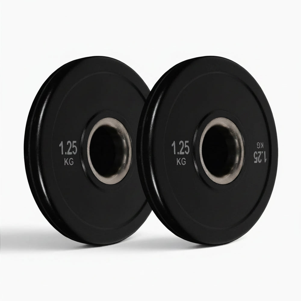 Two black weight plates on a white background