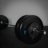 Weightlifting barbell with black weight plates on a dark background