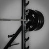 Barbell with weight plates on a gray background