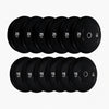 Set of black gym weight plates with labeled weights on a white background