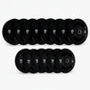 Set of black weight plates with visible branding on a white background