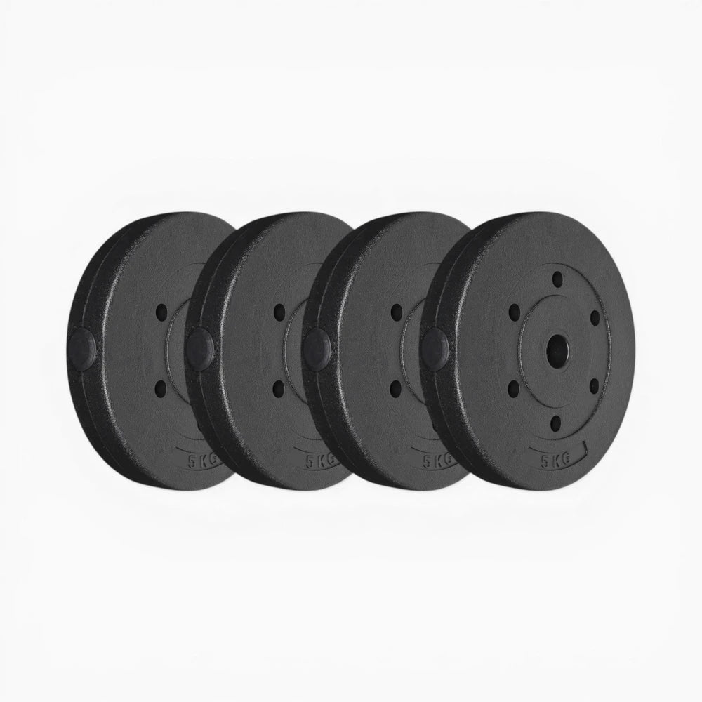 Four black weight plates on a white background