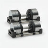 Pair of adjustable dumbbells on a white background