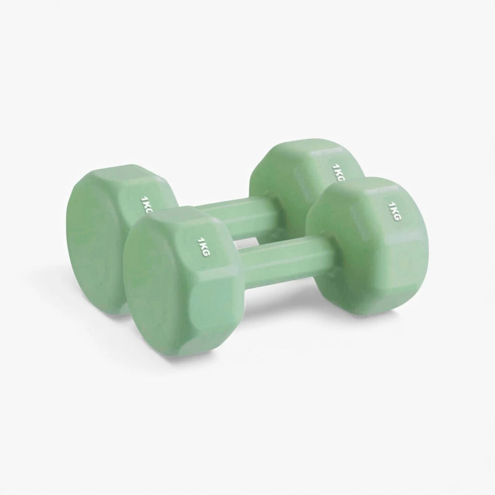 Pair of green dumbbells on a white background
