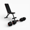 Black adjustable weight bench with dumbbells on a white background