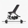 Weight bench with weights and barbell on a white background