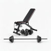 Weight bench with weights and barbell on a white background
