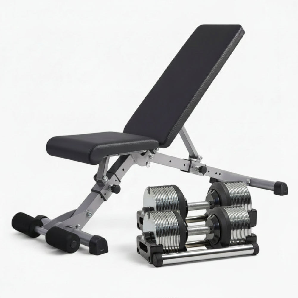 Black adjustable weight bench with weight plates on a white background