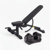 Black adjustable weight bench and dumbbells on a white background