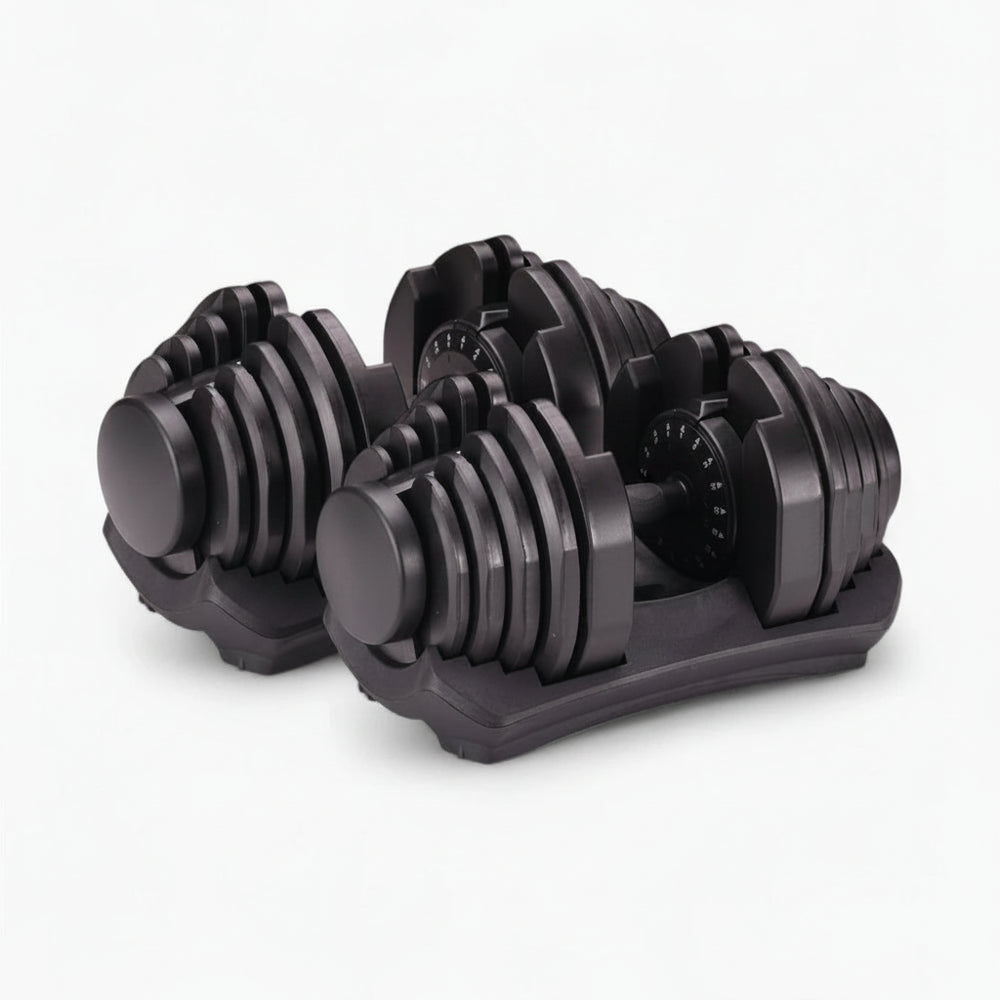 Pair of adjustable dumbbells on a white background