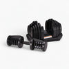 Pair of adjustable dumbbells on a white background