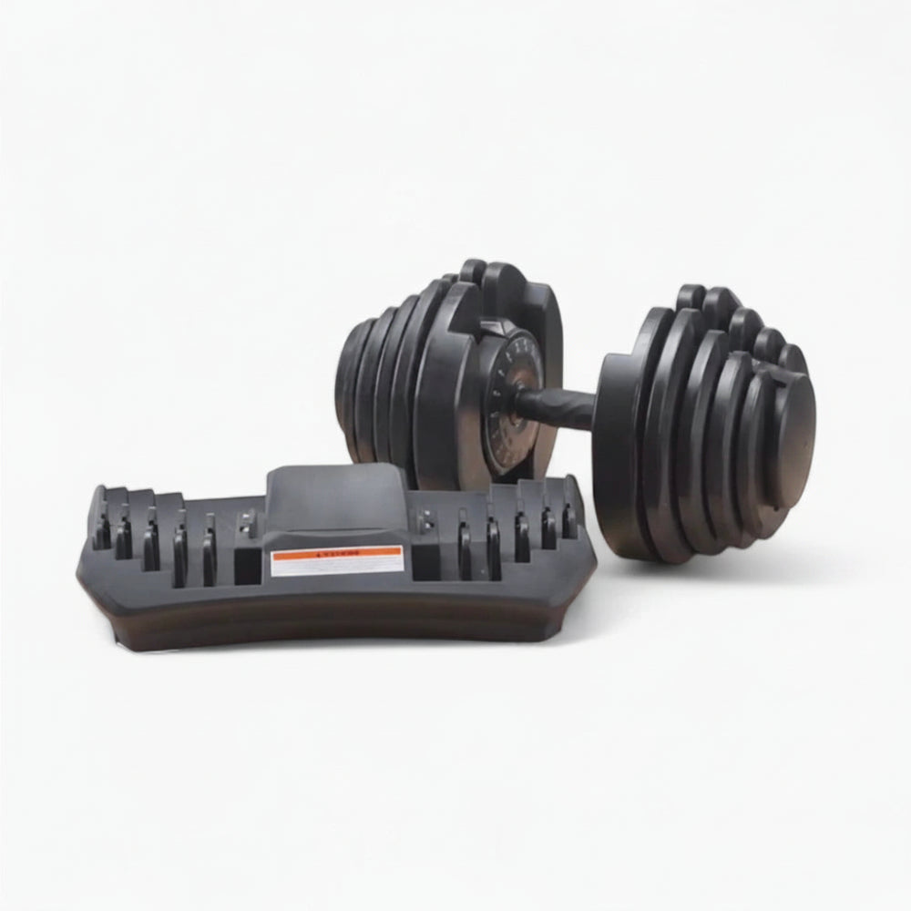 Pair of adjustable dumbbells on a white background