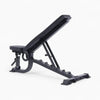 Black adjustable weight bench on a white background