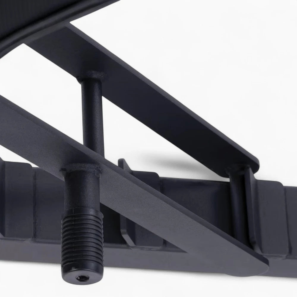 Close-up of a black metal bracket on a white background