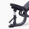 Black adjustable gym bench on a white background