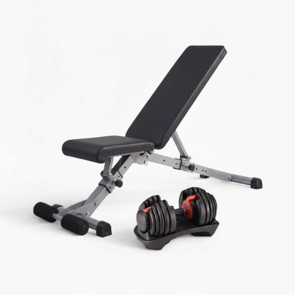 Adjustable weight bench with dumbbells on a white background