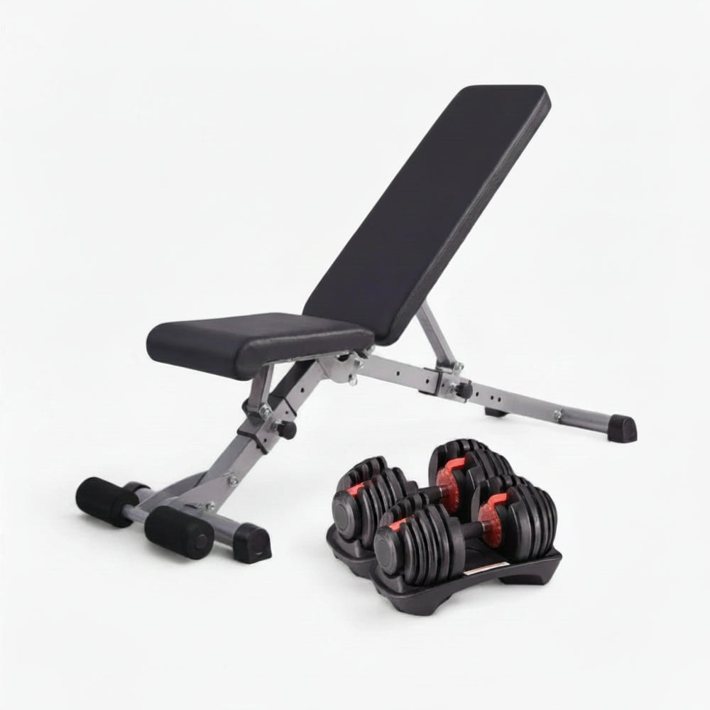 Black adjustable weight bench with red accents and a pair of dumbbells on a white background